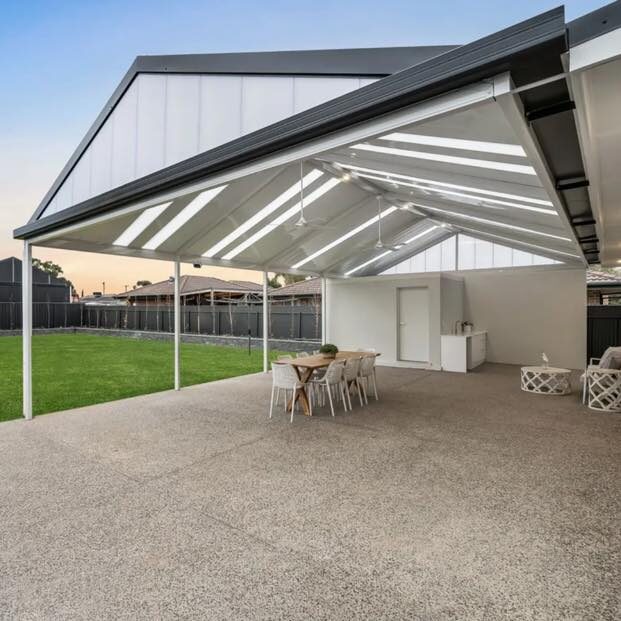 Wide dining alfresco under gable roof