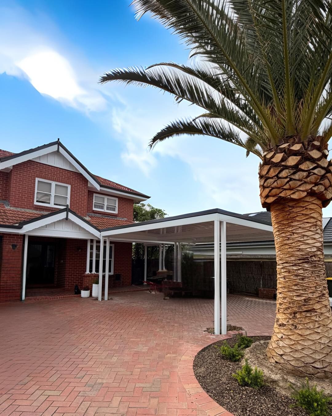 Classic carport beside a brick Adelaide home