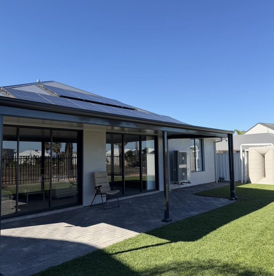 Modern patio with glass doors and outdoor blinds