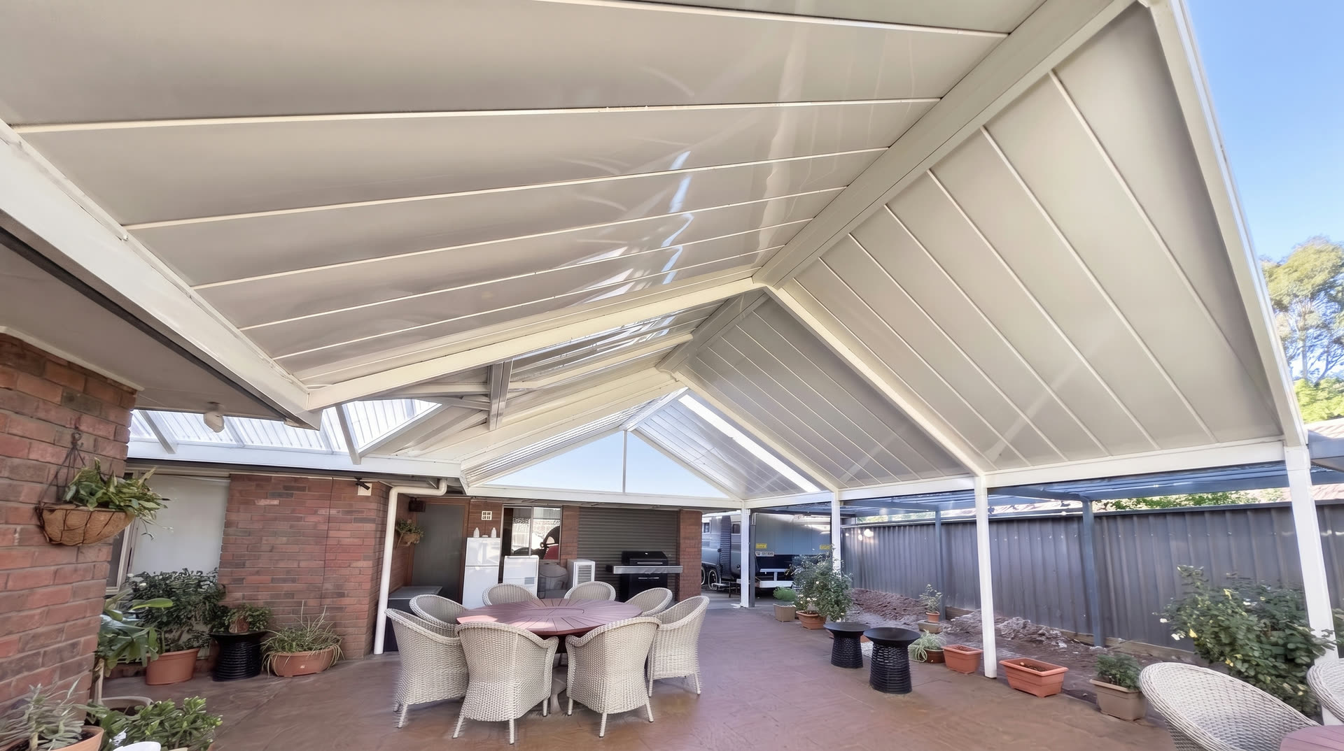 Large airy gable verandah with outdoor seating